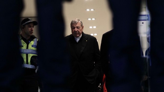 Cardinal George Pell arrives at the Melbourne Magistrates Court on Friday morning.