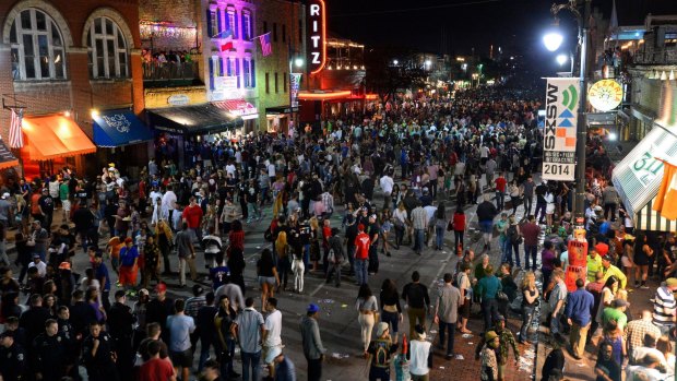 Austin's Sixth Street throngs on on the last day of South by Southwest.