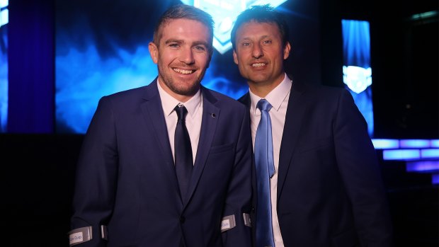Playing days over: Chris Browne with Laurie Daley at the True Blues function. 