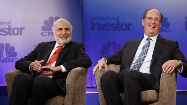 Icahn Enterprises chairman Carl Icahn  and BlackRock  chairman and chief executive Larry Fink at a New york conference.