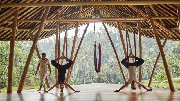Far from it all: A yoga class at the Four Seasons Sayan.