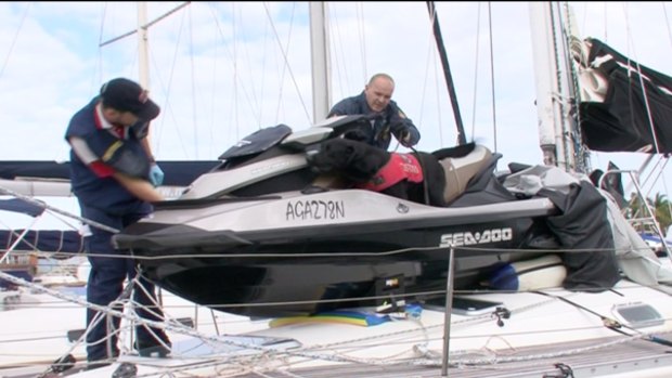 Police searching Simon Golding's yacht.