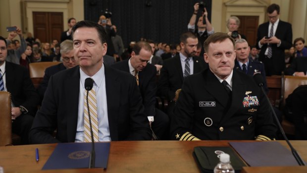 Comey, left, and Michael Rogers, right, testifying before the House Intelligence Committee 
