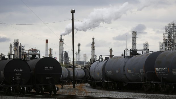 Railroad tanker cars sit parked outside the Paulsboro Refining Company oil refinery in Paulsboro, New Jersey.