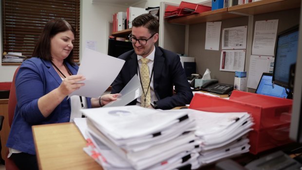 Smith's staff members, Kelli Orrell and Kyle Regan, at their office at Parliament House.