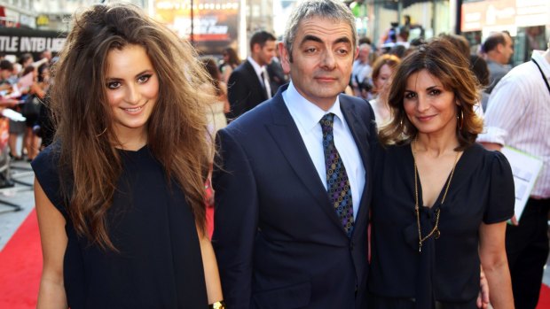 Daughter Lily Atkinson, Rowan Atkinson and then wife, Sunetra in 2011.