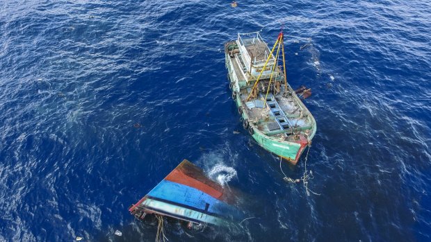 Indonesia sinks an illegal fishing boat in its waters.