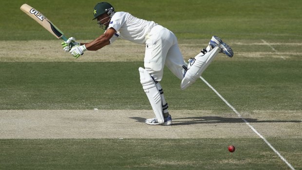 In command: Younis Khan flicks a shot to the leg side on day two of the second Test in Abu Dhabi.