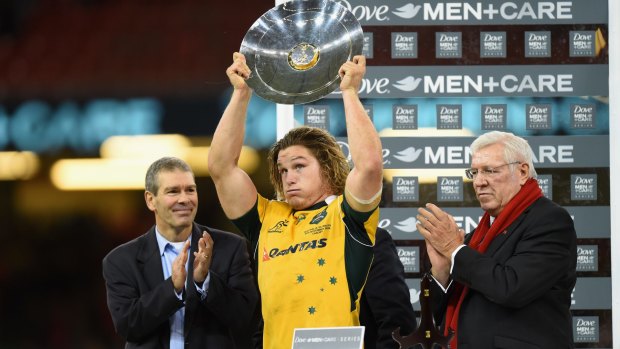 Relieved: Michael Hooper holds up the James Bevan Trophy.