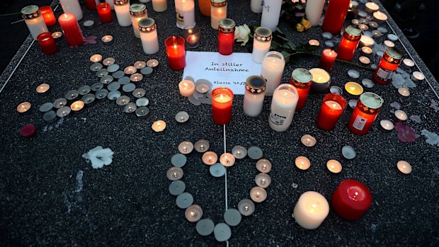 Students and well wishers remember their friends at Joseph-Koenig Gymnasium secondary school in Haltern am See, Germany.