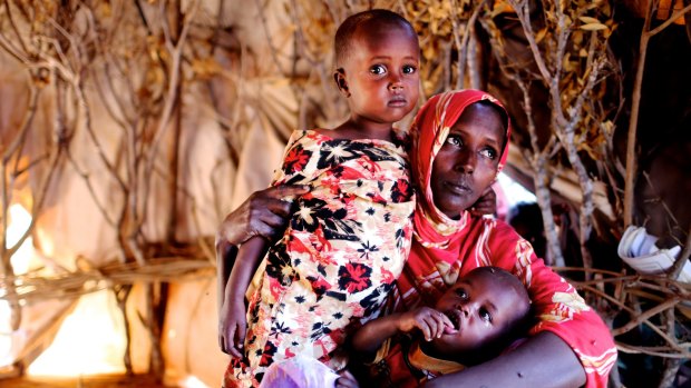 Ladan Waraq Yusuf, 30, with daughter Sahlan, 3, and son Weli, 1. Sahlan  almost died during the Horn of Africa famine in 2011 but received treatment at Dadaab refugee camp just in time. 