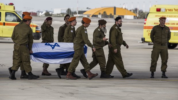 The bodies of three Israeli tourists killed in Istanbul on Saturday are returned to Tel Aviv.