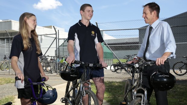 University of Canberra High School year 10 students Hannah Pengilly and Thomas D'Arx chat with Minister for Road Safety Shane Rattenbury after the launch of the ACT Road Safety Action Plan 2016-2020.