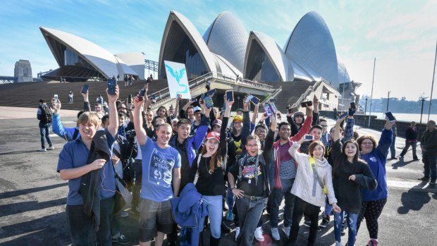 Pokemon Go fans meet at the Opera House on Sunday.