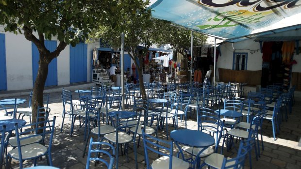 Empty tables are seen at the terrace of a coffee shop in Sidi Bou Said near Tunis.