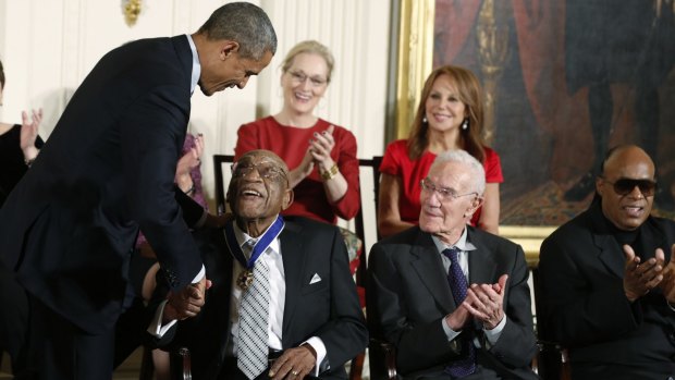U.S. President Barack Obama presents a Presidential Medal of Freedom to Sifford.