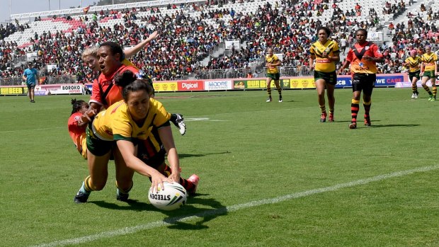 Over the line: Corban McGregor scores for the Jillaroos in Port Moresby.