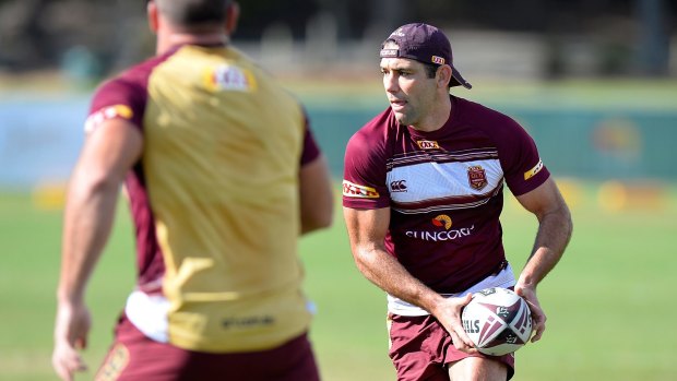 Go-to man: Cameron Smith runs a play during a Queensland training session at Sanctuary Cove.