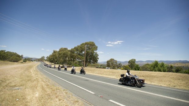 A motorcycle hearse carried Mr McFawn's body.
