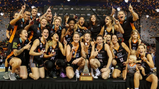 Townsville Fire celebrate winning the 2017/2018 WNBL championship.