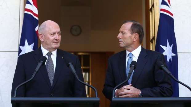 With Prime Minister Tony Abbott last year at the announcement of his appointment as governor-general. 