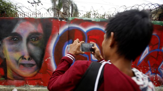 Graffiti congratulating Myanmar's opposition leader Aung San Suu Kyi in Mandalay on Wednesday. 