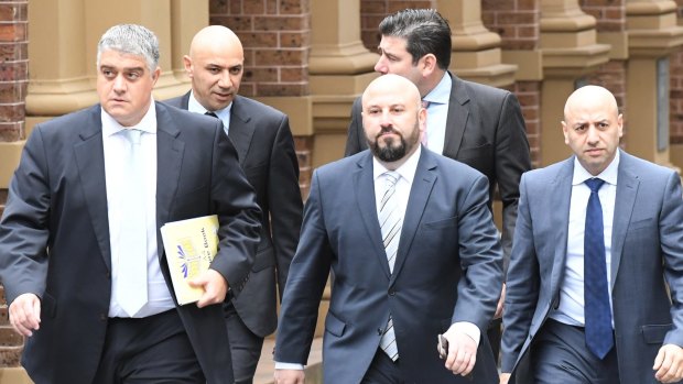 From left, lawyer Nick di Girolamo, Moses Obeid, Eddie Obeid jnr, lawyer Tim Breene (back) and Paul Obeid at the Supreme Court last year.