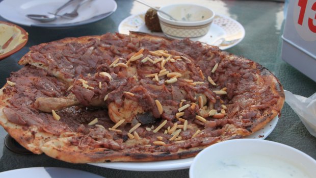 Musakhan, a Palestinian dish, is served at Qwaider al Nabulsi.
