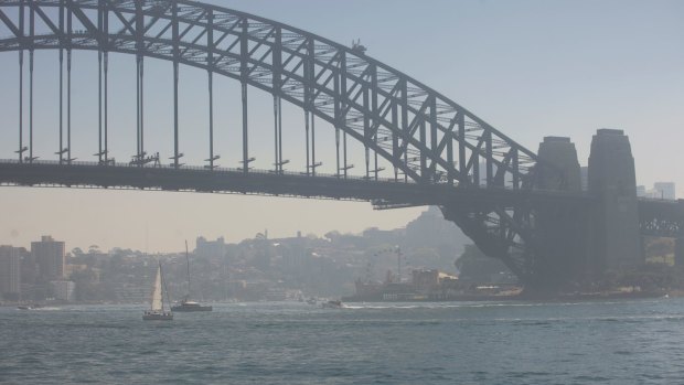 Sydney Harbour was covered in a smoke haze caused from hazard reduction burns on Saturday.