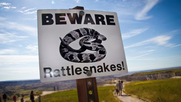 Beware Rattesnakes! Sign in Badlands National Park,