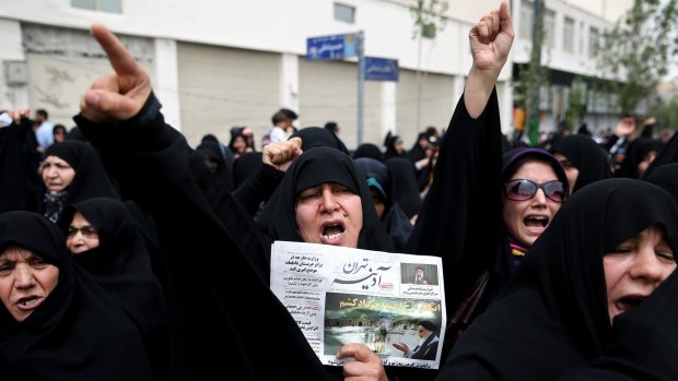 Iranians rally to reject any concessions to the West after Friday prayers in Tehran. 