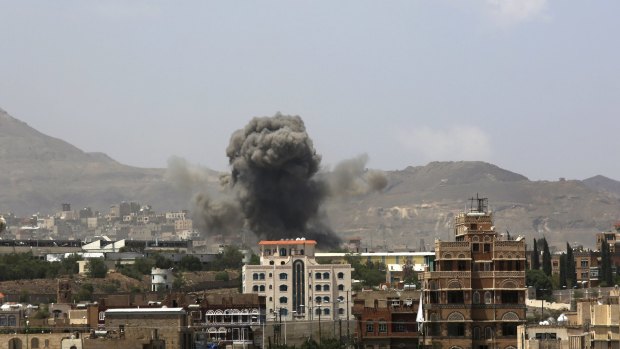 Smoke rises after a Saudi-led airstrike hits an army base in Sanaa, Yemen on September 14.