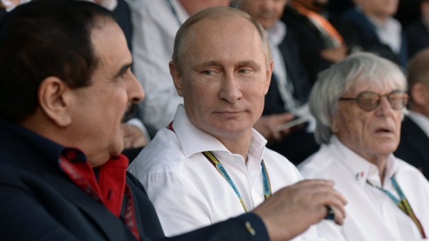 Dignitaries: Bahrain's King Hamad bin Isa Al Khalifa, Putin and Ecclestone.