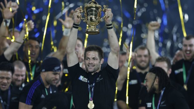 Winners: New Zealand's captain Richie McCaw holds up the World Cup.