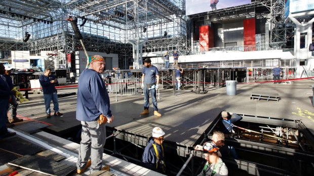 Workers prepare the Manhattan stage Democratic presidential candidate Hillary Clinton will use on election night.