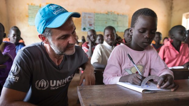 Hosseini visits students at Nyumanzi Integrated Primary School for Ugandan nationals and refugees from South Sudan.