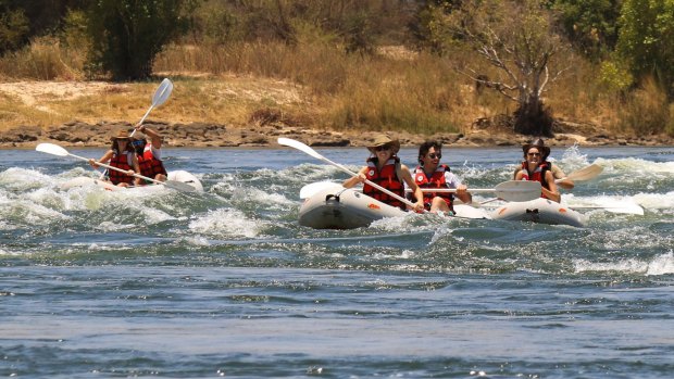 Inflatable canoes handle white water with ease.