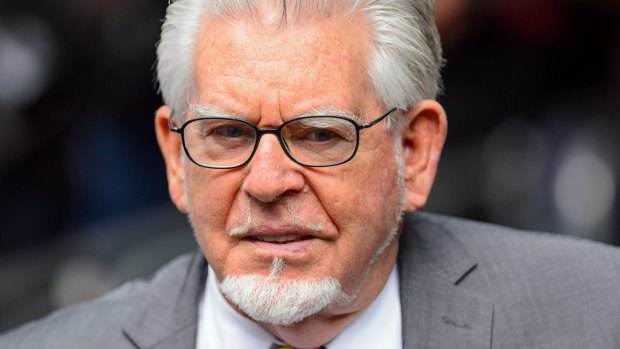 Rolf Harris is facing a London court on four charges of groping teenage girls.