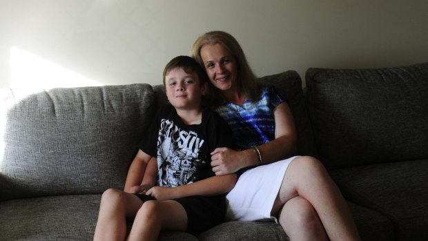 Brodie Collins and his mum, Tracey, at their family home in Harrison.