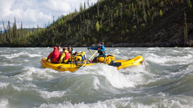 Rafting the rapids of the South Nahanni River. 