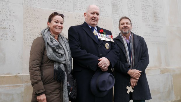 David and Tracey Evans, from Adelaide, with Sir Peter Cosgrove (centre) were on their first visit to the Somme.