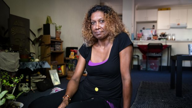 Fi, who was homeless for 10 years, now lives in an apartment in Sydney. 
