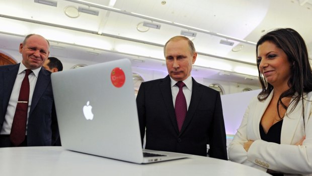 Russian President Vladimir Putin and the editor-in-chief of RT, Margarita Simonyan.