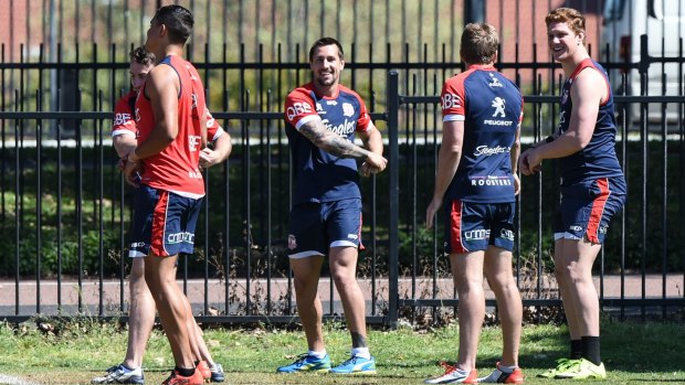 Rooster returns: Mitchell Pearce, centre, has been named in the Sydney Roosters line-up for their grand final qualifier against the Broncos.