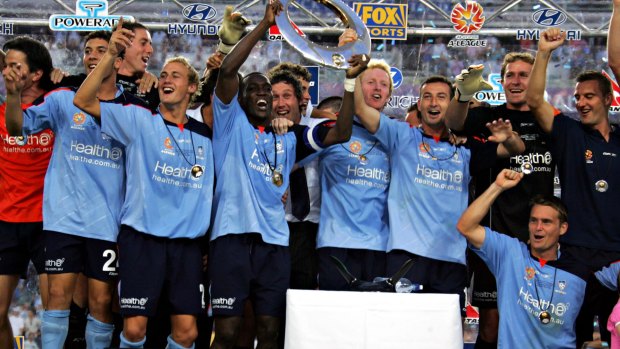 Dwight Yorke and Sydney FC celebrate the inaugural championship.