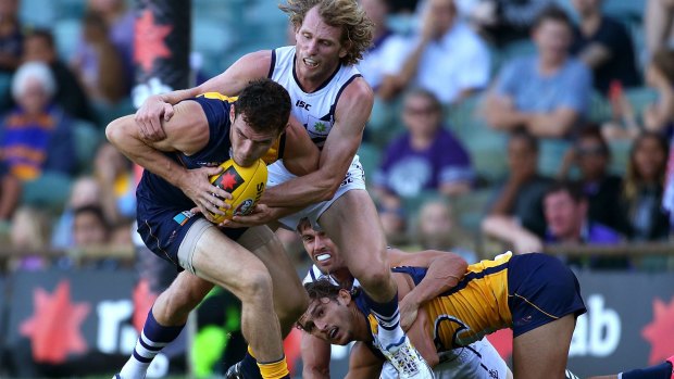 The rivalry between the fans of WA's two AFL teams is as intense as it gets.