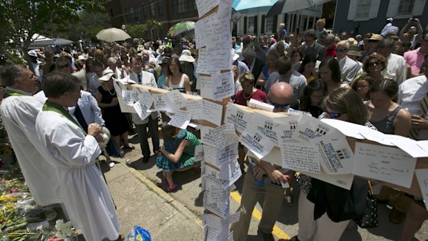 Congregants from other churches pray outside the Emanuel African Methodist Episcopal Church in Charleston, South Carolina.