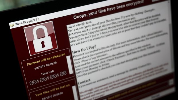 A lock screen from a cyber attack warns that data files have been encrypted.