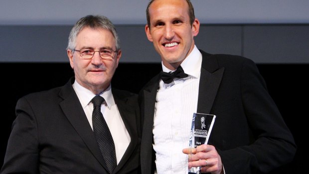"There are a lot of areas where the game needs money ... but grassroots football is the key": Jack Reilly, pictured with former Socceroos goalkeeper Mark Schwarzer.