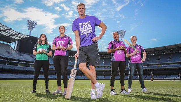 Nick Riewoldt poses with Gemma Triscari, Emma Inglis, Alana King and Jess Cameron at the MCG on Friday.